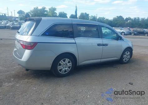 2012 Honda Odyssey Lx z USA, uszkodzony, nr VIN 5FNRL5H25CB049279